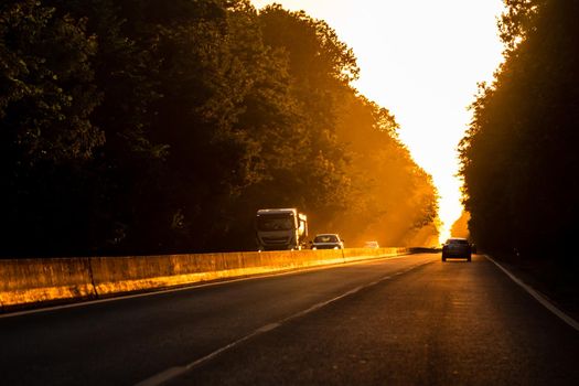 Car traffic at rush hour. Traffic jam, cars on the road at sunset in Bucharest, Romania, 2021