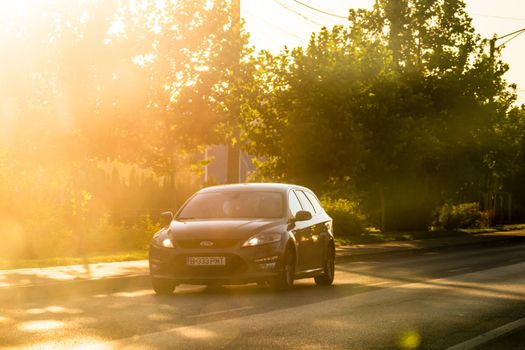 Car traffic at rush hour. Traffic jam, cars on the road at sunset in Bucharest, Romania, 2021