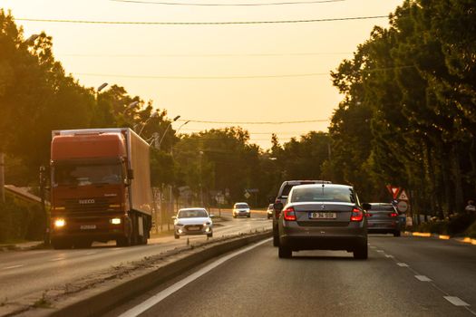 Cars in traffic at rush hour in downtown area of the city. Car pollution, traffic jam in the morning and evening in the capital city of Bucharest, Romania, 2021