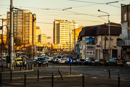 Cars in traffic at rush hour in downtown area of the city. Car pollution, traffic jam in the morning and evening in the capital city of Bucharest, Romania, 2021