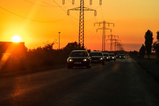 Car traffic at rush hour. Traffic jam, cars on the road at sunset in Bucharest, Romania, 2021