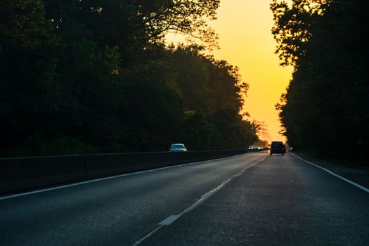 Car traffic at rush hour. Traffic jam, cars on the road at sunset in Bucharest, Romania, 2021