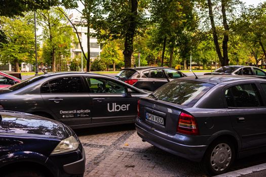 Cars in traffic at rush hour in downtown area of the city. Car pollution, traffic jam in the morning and evening in the capital city of Bucharest, Romania, 2021