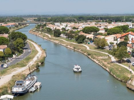 Aigues-Mortes France. The port city of Aigues-Mortes. Yachts moored off the coast. The maritime channel flows into the Mediterranean Sea.