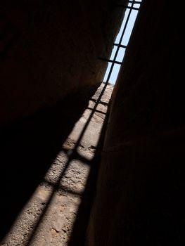 Shadow in an old window castle