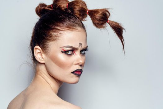 beautiful woman naked shoulders cosmetics bright makeup studio model. High quality photo