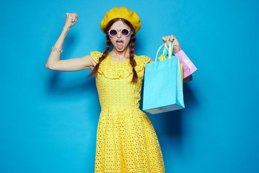 pretty woman wearing sunglasses posing shopping fashion isolated background. High quality photo