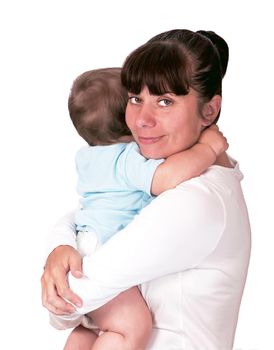 Happy young mother kissing baby on a white background