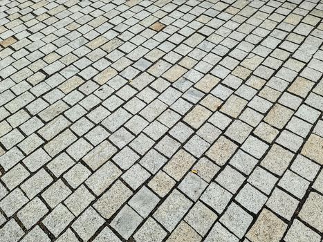 Close up view on old historical cobblestone roads and walkways all over europe