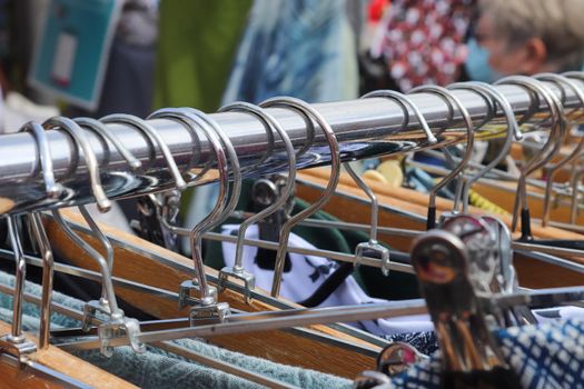 Detailed close up view on samples of cloth and fabrics in different colors found at a fabrics market.