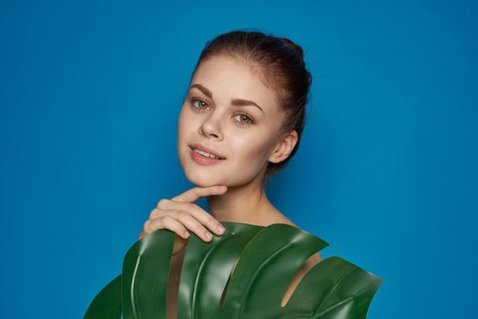 pretty woman palm leaf bare shoulders spa treatments. High quality photo