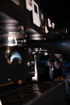 close up of a professional coffee machine. loft dark coffee shop.