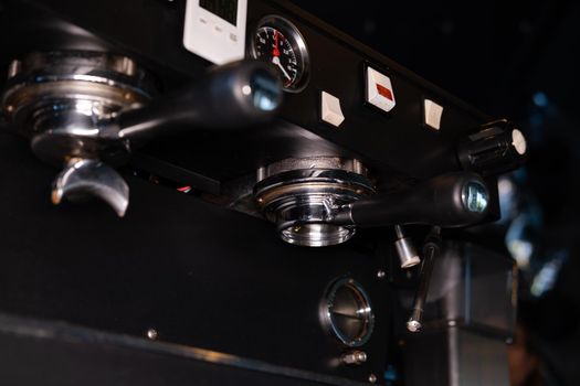 close up of a professional coffee machine. loft dark coffee shop.