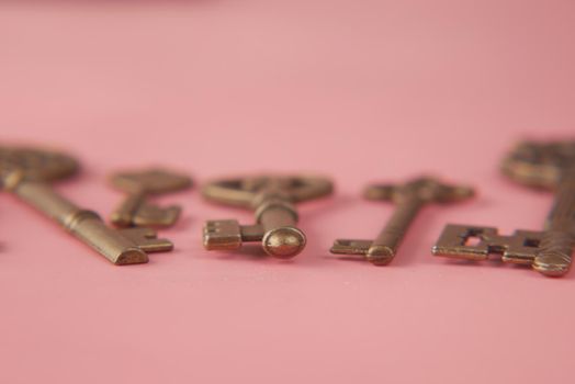 many old keys on pick background .
