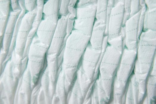 stack of baby diaper on table