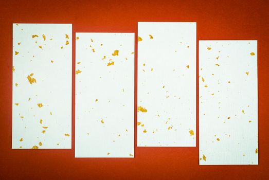Paper with gold sheet texture on red background for your text or message.