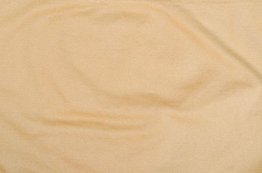 Brown fabric texture for clothes, as background.