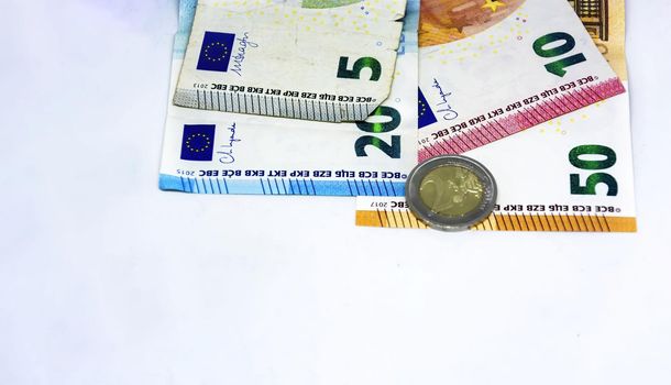 European Union coins and banknotes of different values. The euro is the European currency. Finance, economy and business. Cash and savings