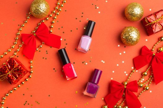 Nail polish in a New Year 's layout . New Year's gift cosmetics. The layout of the new year. A holiday gift.