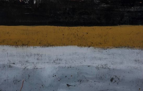 Old yellow metallic sheet with paint stains, grunge background or texture
