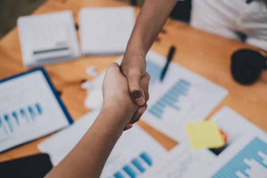 Female hands shaking at meeting making partnership deal, businesswomen handshaking as concept of respect, successful teamwork, collaboration and support, women power in business, top close up view