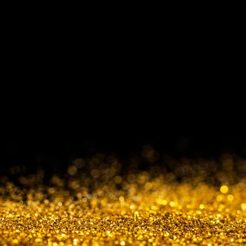 dazzling gold glitter with copy space. High resolution photo