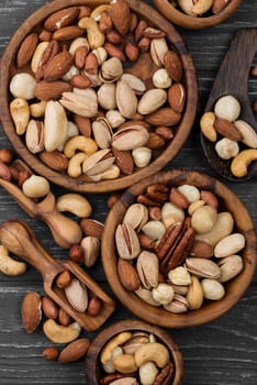 assorted bowls delicious nuts snack. High resolution photo