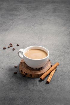 high angle coffee cup with cinnamon sticks copy space. High resolution photo