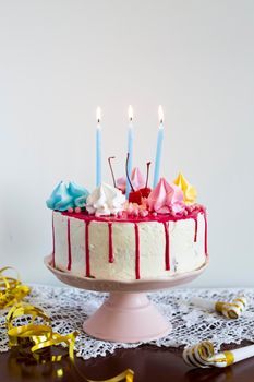 birthday cake with lit candles. High resolution photo