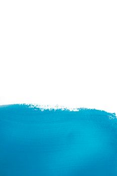 vivid blue colored paint brushstroke. High resolution photo