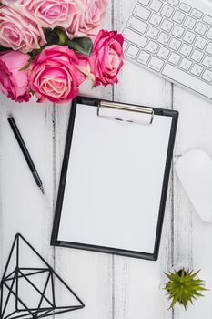 close up top view notepad with bouquet flowers. High resolution photo