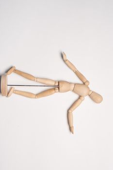 wooden mannequin object close up light background. High quality photo