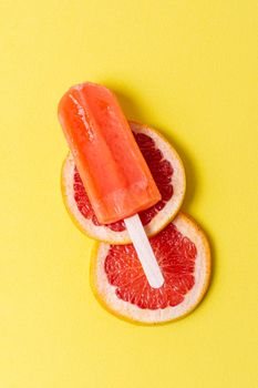 delicious summer popsicle with slices grapefruit. High resolution photo