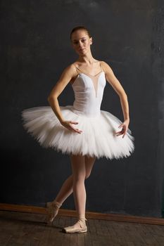 woman ballerina in white tutu performance grace dance. High quality photo