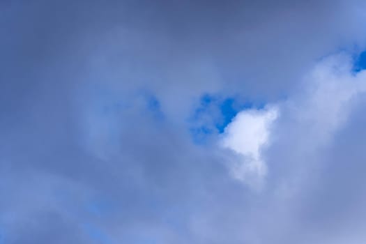 Cumulus clouds on blue sky, background of white clouds on the sky. . Weather phenomenon in the atmosphere