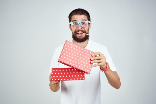 bearded man box with gift holiday fun birthday. High quality photo
