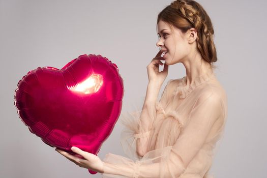 beautiful woman balloon heart gift fashion holiday. High quality photo