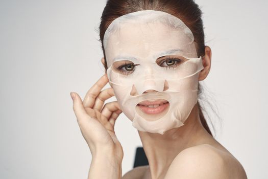 woman in cosmetic mask facial skin care rejuvenation. High quality photo