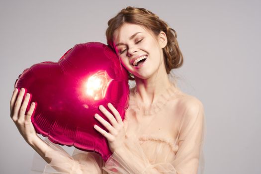 pretty woman heart balloon posing romance holiday. High quality photo