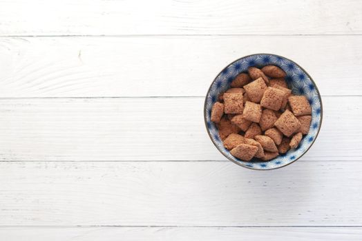 sweet fills chocolate in a bowl on table .