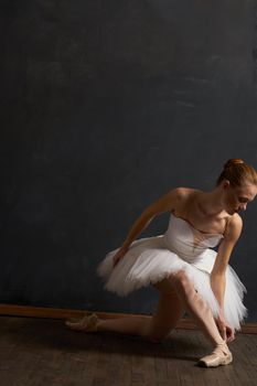 woman ballerina in white tutu performance grace dance. High quality photo