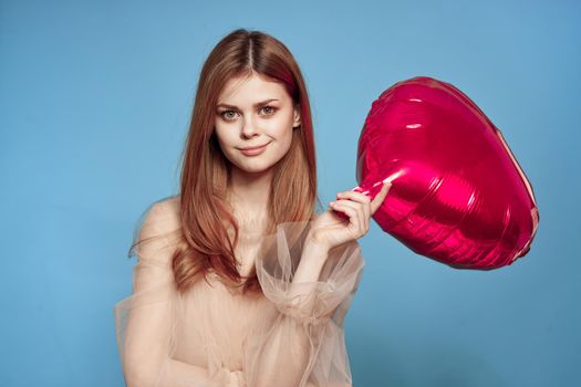 portrait of a woman heart balloon holiday Valentine's Day isolated background. High quality photo