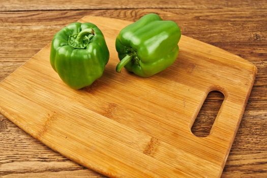 pepper cutting board vegetables healthy food ingredients. High quality photo