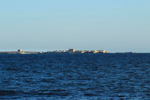 Tabarca Island and mediterranean sea under the sun in the morning