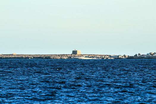 Tabarca Island and mediterranean sea under the sun in the morning