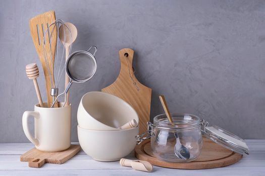 Close-up of kitchen utensils and containers made of wood, metal and glass. Eco-friendly materials, no plastic concept. Selective focus. Copy space.