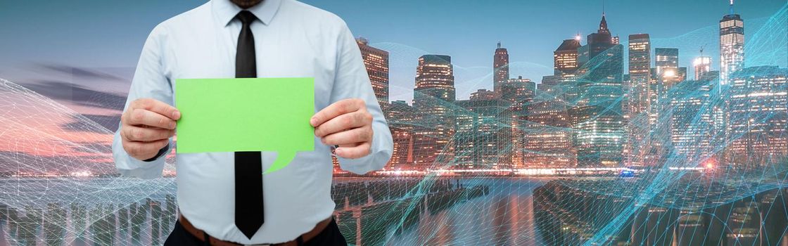 Businessman Holding Chat Box With Both Hands Around Futuristic Technology.