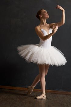 woman ballerina in white tutu performance grace dance. High quality photo