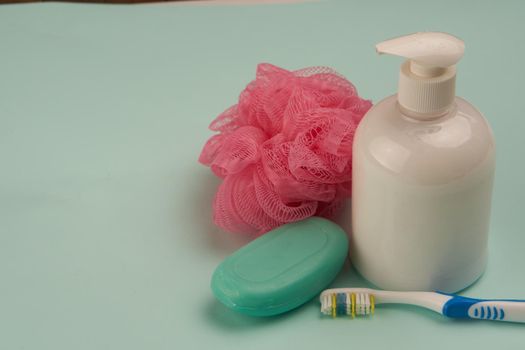 soap hygiene body care bathroom supplies green background. High quality photo