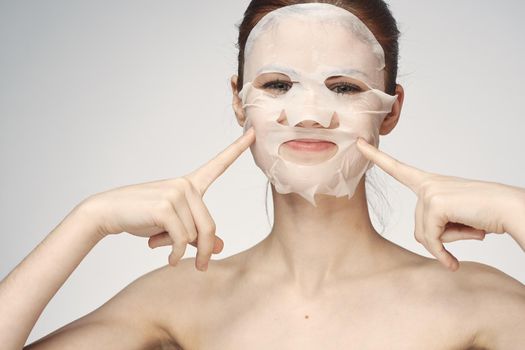 woman in cosmetic mask facial skin care rejuvenation. High quality photo